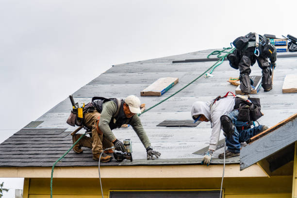 Professional Gutter Installation technician working in Fort Jones, CA